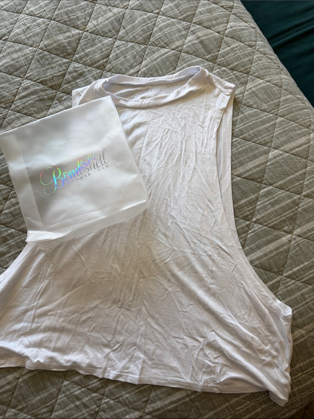 Bombshell Sportswear White Sleeveless Muscle Tank with Holographic Logo Pouch